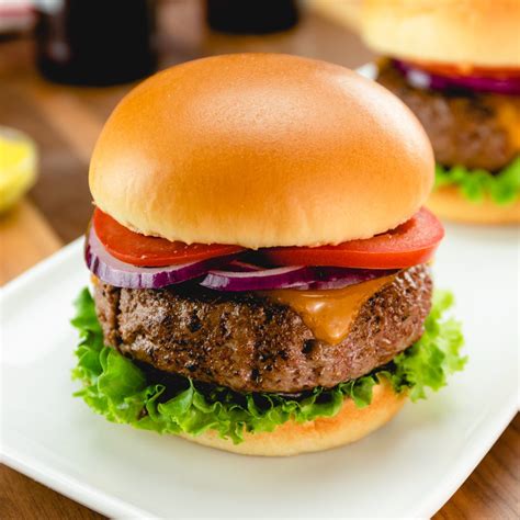 8oz burger - Divide the meat into 4 equal portions (about 6 ounces each). Form each portion loosely into a 3/4-inch-thick burger and make a deep depression in the center with your thumb. Season both sides of ...